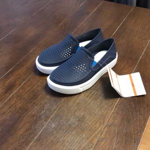 Blue brand new crocs for girls or boys